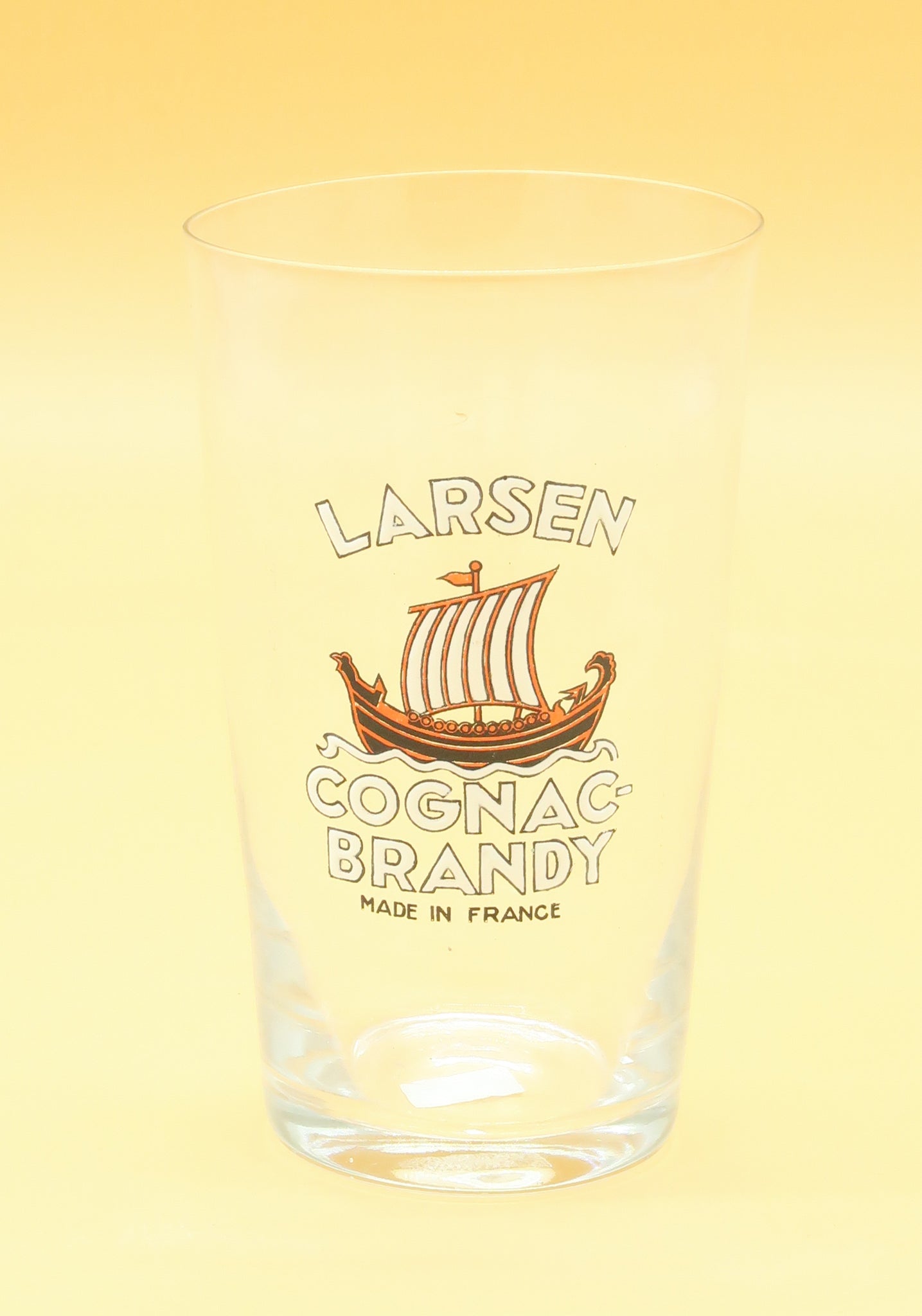 Ancien verre Cognac Larsen émaillé